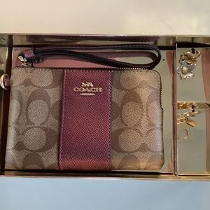 Coach wristlet wallet with charms, brand new